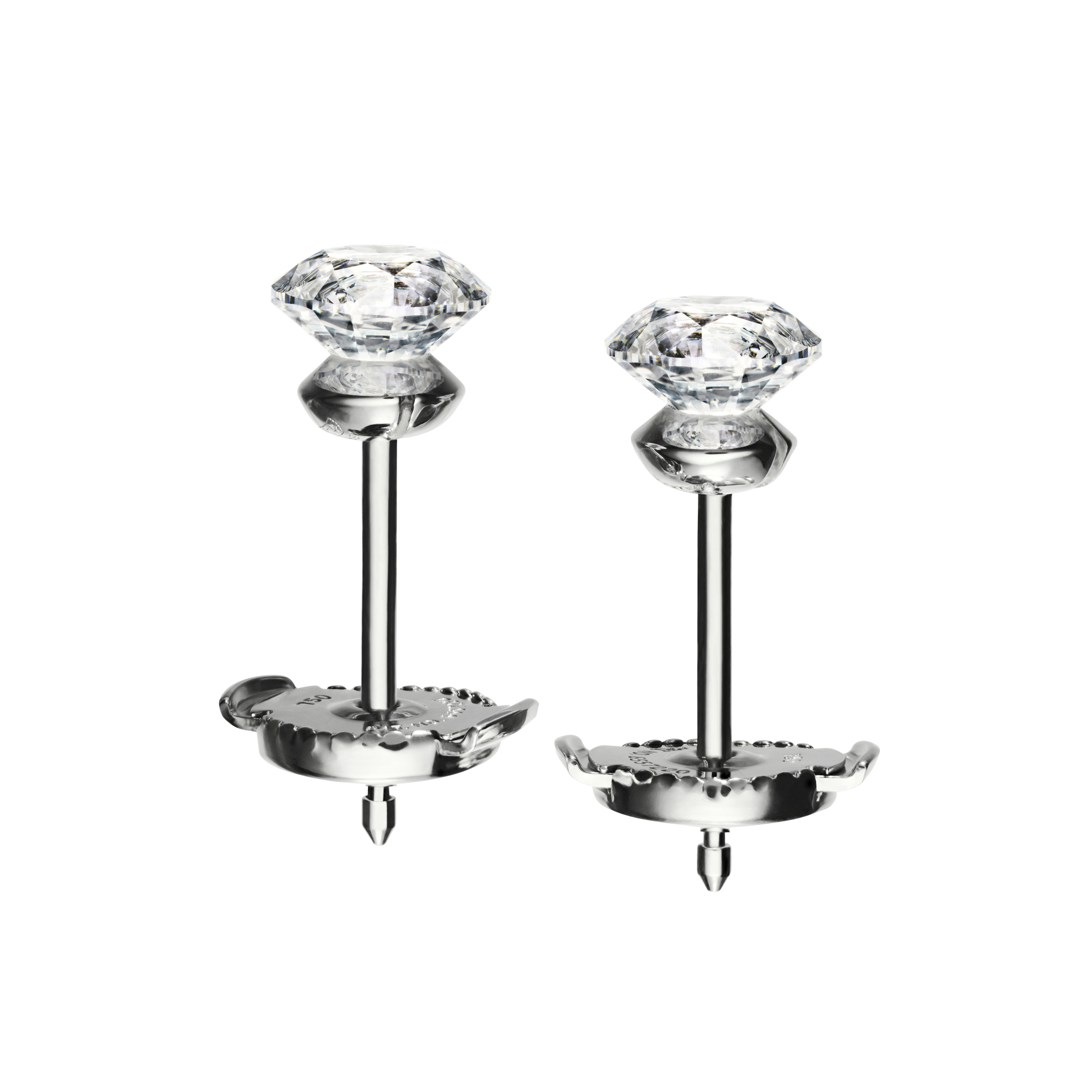 A detail of Floating Diamond Studs M in White Gold